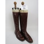 A pair of good quality vintage leather riding boots, with kid leather trim,