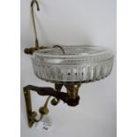 A vintage brass wall mounted water/dentist's fountain with glass bowl and ornate bracket est: