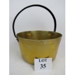 A good large 19th century brass preserve pan with steel loop handle,