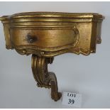 A highly decorative vintage miniature gilt-wood console table in the 18th century continental taste,