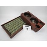 Approximately 600 plus gaming counters contained within a mahogany six section case,