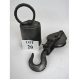 A vintage industrial pulley with swivel hook to one end, 34 cm long,