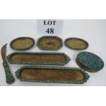 An eastern mosaic hard-stone mounted seven piece ensemble, comprising an oval box with hinged lid,