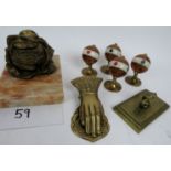 A set of four 'globe' form card suit-markers, a 'fish' paperweight, a 'hand' paper clip,