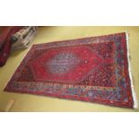 An Iran rug with Kayan label (wear to fr