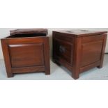 A pair of 20th Century hardwood storage trunk / side tables with lift up tops revealing internal