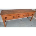 A large 19th Century pine dresser base with three large drawers with bun handles est: £100-£150