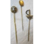 A collection of three stick pins to incl