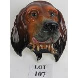 Ceramic wall plaque of a dog's head made