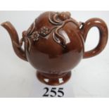 A 19th century treacle glaze pottery cad