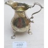 A small Georgian silver cream jug, with
