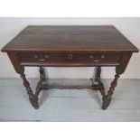 A Georgian oak country side table with a