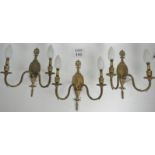 A set of three neo-classical style gilt-