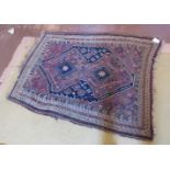 An early 20th century Persian rug on bro