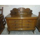 A 20th Century oak sideboard with three