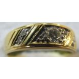 Possibly 18ct gold ring inset with five