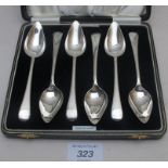 A set of six silver grapefruit spoons, B