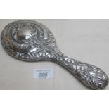 A heavily embossed hand mirror est: £30-