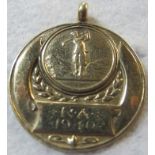 A 9ct gold 1940 golfing medallion, approx 7.