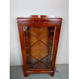 A 20th Century mahogany display cabinet