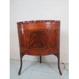 A Georgian mahogany inlaid corner washst