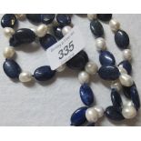 145cts lapis lazuli and cultured pearl necklace, 36" continuous, (large 18 x 13 mm lapis),