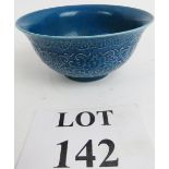A Chinese turquoise blue bowl with carve