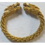 A Chinese gold coloured metal bracelet w