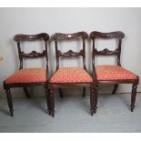 A set of three Victorian carved mahogany