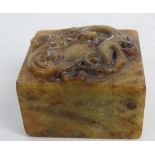 A Chinese carved stone seal with dragon