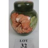 Moorcroft ginger jar flowers on a green