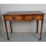 A 20th Century mahogany side table with two frieze drawers over tapering legs est: £50-£100