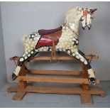 A large early 20th Century dapple rocking horse,