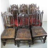 Nine oak dining chairs to include a set of six Victorian oak dining chairs with red leather seats