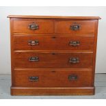A late Victorian mahogany chest of two short over three long drawers with brass handles est: