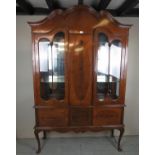 A fine C1920's mahogany and walnut display cabinet with a central inlaid panel flanked either side