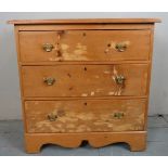 An Edwardian pine small chest of three drawers with brass handles est: £40-£60