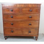 A 19th Century mahogany chest of two short over three long graduated drawers with turned handles