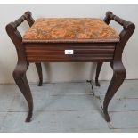 An Edwardian piano stool with a lift up upholstered seat est: £25-£45