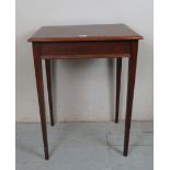 An Edwardian mahogany lamp table with cross banding to top over tapering legs est: £30-£50