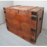 A rustic pine 19th Century trunk with a lift up lid and iron straps and handles est: £80-£120