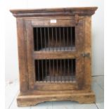 A rustic 19th Century oak table top food safe with an iron spindle door est: £50-£80