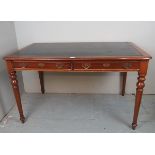 A Victorian design mahogany library desk with an inset green leather top over two drawers est: