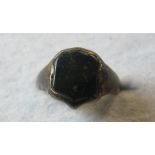 A blood stone set signet ring est: £40-£