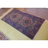 An old Baluchi rug, 165 cm x 91 cm appro