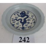 A Chinese period-style blue and white po