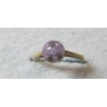 A ball shaped amethyst ring, size N est: