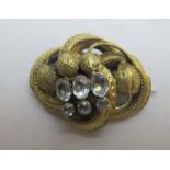 A Victoria brooch inset with six crystal