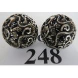 Two Chinese white-metal spherical forms,