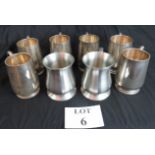 Six silver plated tankards and two Londo